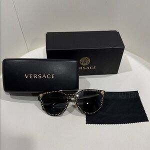 Versace Women's Sunglasses with Black and Gold Accents